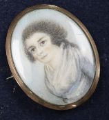 An early 19th century oil on ivory miniature of a lady, 5.5 x 4cm.