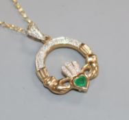 A modern 9ct gold, diamond and heart shaped emerald sweetheart pendant, on a 9ct gold chain, 20mm