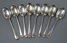 A set of six Edwardian silver rat tail dessert spoons, William Hutton & Sons, London, 1905 and two