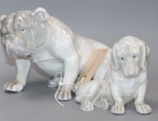 Two Heubach Gebruder figures of a bulldog and a dachshund