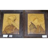 A pair of mahogany inlaid portrait panels, signed James F.P. Camm 1936