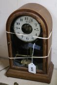 A Bulle mahogany electric mantel timepiece