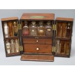 A 19th century mahogany apothecary cabinet