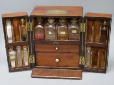 A 19th century mahogany apothecary cabinet