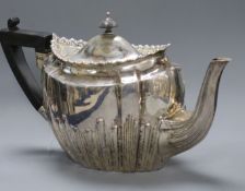A late Victorian demi fluted silver teapot by James Dixon & Sons, Sheffield, 1900, (repair), gross