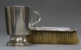 An Edwardian silver christening mug by Mappin & Webb, Sheffield, 1905 and a silver mounted brush.