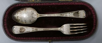 A cased Victorian silver christening fork and spoon, G.M. Jackson, London, 1889.