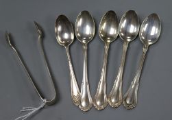 Five silver teaspoons and a pair of silver sugar tongs.