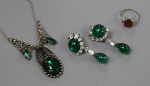 A pair of green and white paste set drop earrings, a paste necklace and paste set ring.