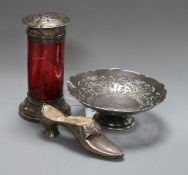 A silver shoe pin cushion, Adie & Lovekin, Chester 1922 (a.f.), a silver-mounted ruby glass sugar