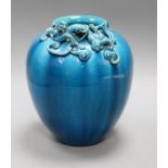 A Japanese turquoise glazed 'dragon' jar height 21.5cm