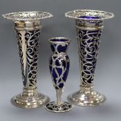 A pair of Edwardian silver vases, William Gibson, London, 1902, 7in. and a small overlaid vase,