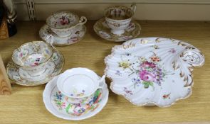 A Dresden dish and four floral and gilt cabinet cups and saucers