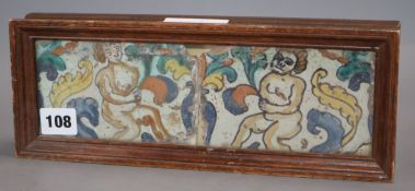 A framed majolica tile remnant overall length 30cm