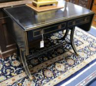 A Regency style ebonised and parcel gilt sofa table, W.95cm