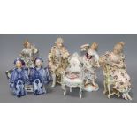 Two pairs of Continental porcelain figures, a pair of pagoda figures and a chair