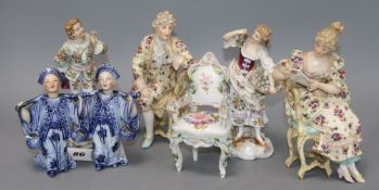 Two pairs of Continental porcelain figures, a pair of pagoda figures and a chair