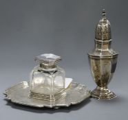 A late Victorian silver inkstand, London, 1899 and an Edwardian silver sugar caster. 11 oz.