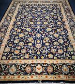 A Kashan carpet 330 x 236cm