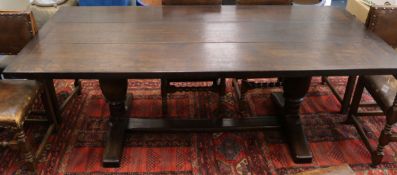 An oak refectory table fitted three-plank top on turned bulbous supports, 214 x 94cm