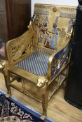 An Egyptian revival painted and giltwood throne chair W.60cm H.111cm