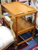 A 1960's metamorphic teak tea trolley W.68cm