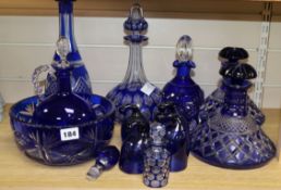 A quantity of Bristol blue decanters and glassware
