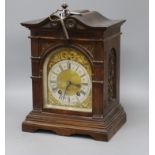 A German mahogany and walnut mantel clock height 35cm