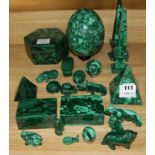 A group of assorted malachite ornaments