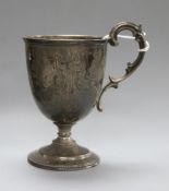 A Victorian engraved silver pedestal christening mug, Daniel & Charles Houle, London, 1863, 12.6cm.