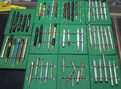 A collection of vintage propelling pencils in a tin case (57)