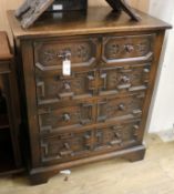 A 1920's Jacobean Revival small oak chest W.77cm