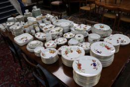 A very extensive Royal Worcester Evesham oven proof service of fruit decorated ware and tureens