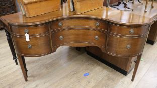 A George III style mahogany corner sideboard W.151cm