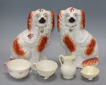 Four Belleek items and a pair of Staffordshire spaniels