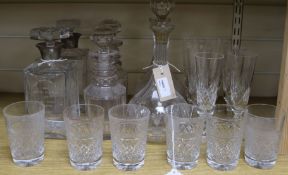 A collection of table glass, including three pairs of decanters, six champagne flutes and six cut-