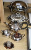 A silver plated muffin dish, three piece teaset, entree dish, inkstand, etc.