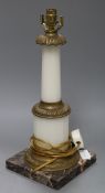 A marble and metal mounted table lamp on marble base