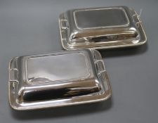 A pair of Asprey & Co silver plated entree dishes