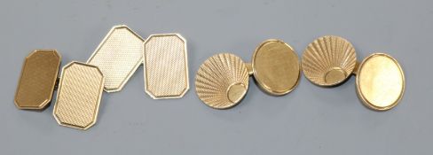 Two pairs of 9ct gold engine-turned cufflinks.