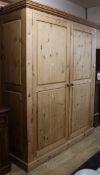 A modern pine wardrobe W.196cm