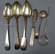 A Georgian silver sifter spoon, three Georgian silver tablespoons, a 19th century silver butter