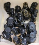 Nine pairs of binoculars