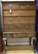 A mid 18th century oak chest on stand, W.100cm
