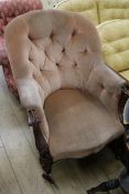A Victorian carved mahogany armchair