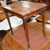 An early 18th century yew centre table W.68cm