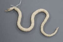 An unusual ivory articulated snake, early 20th century length 42.5cm