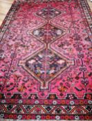 A North West Persian geometric carpet 310 x 215cm