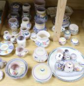 A large collection of Carter Stabler Adams and Poole pottery floral-decorated table ware,