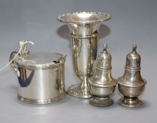 A George V silver drum mustard, London, 1928, a silver vase and a pair of silver pepperettes